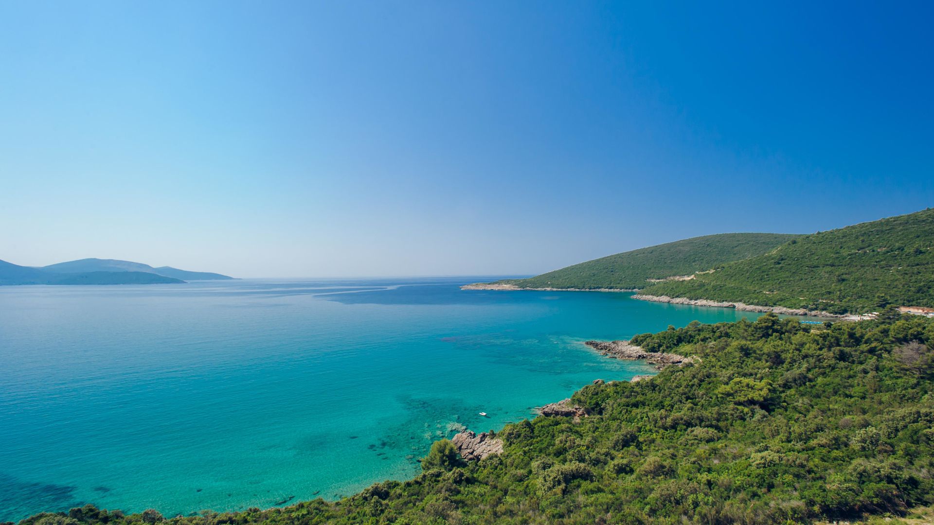 Green Mountains Surround The Sea At Lustica Bay Peninsula 