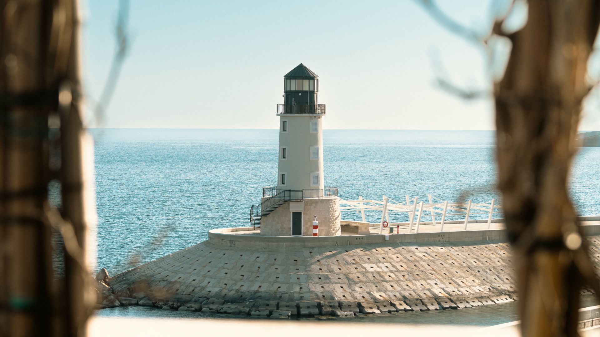 A Lighthouse On A Pier